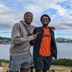 Two friends in front of a lake in Seattle