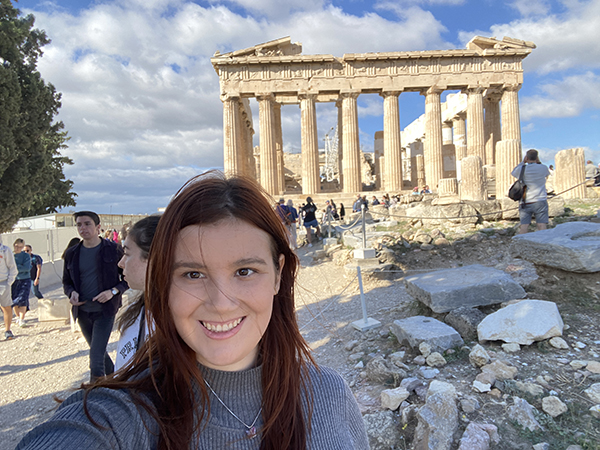 Girl in a selfie in front of The Parthenon 