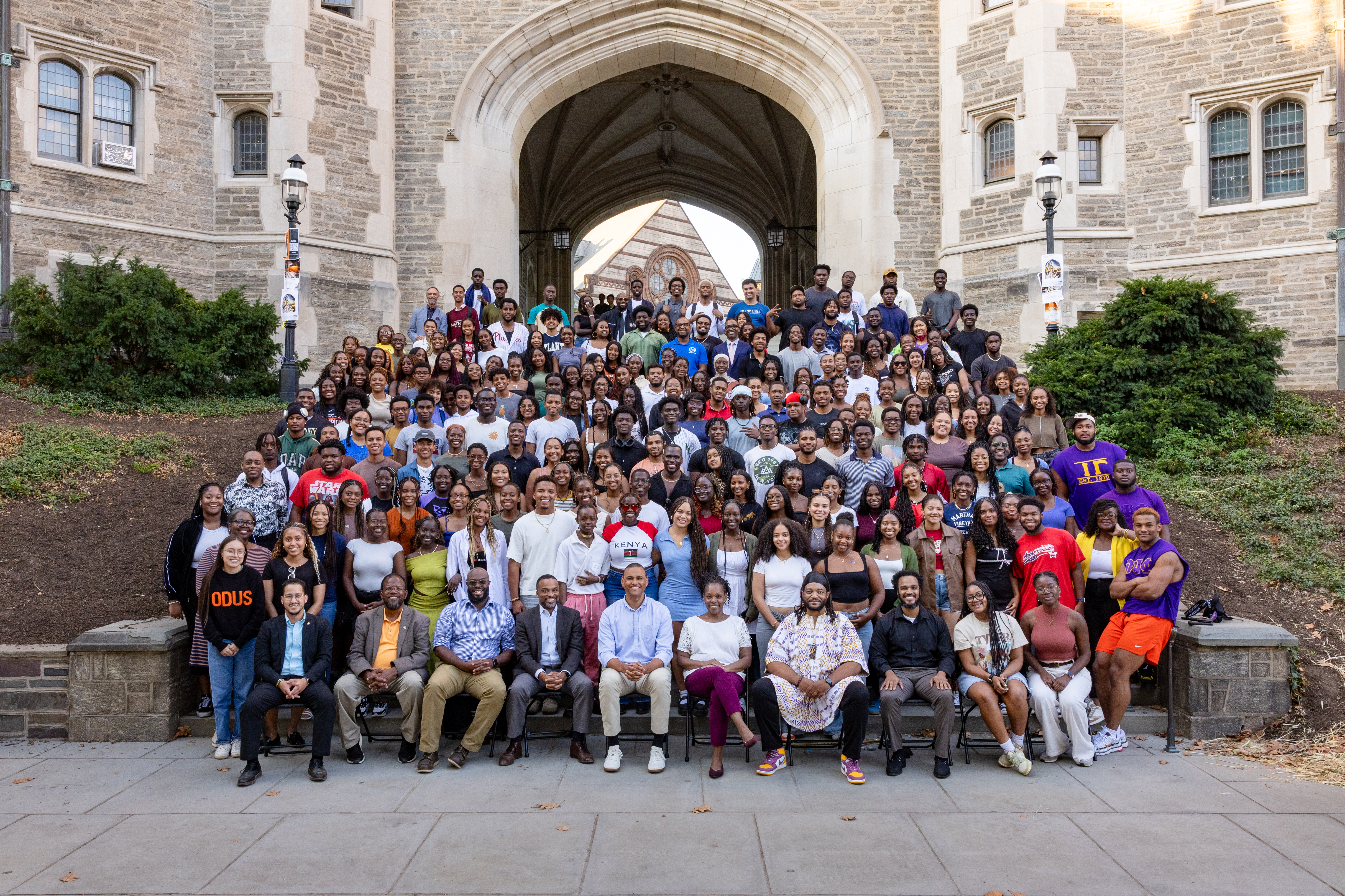 A group of Black students and faculty assembled on Blair Arch