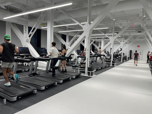 Center aisle and cardio equipment of the renovated gym