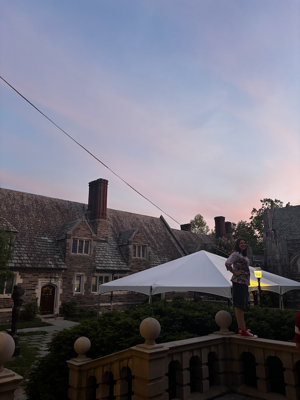 A sunset over a residential college building