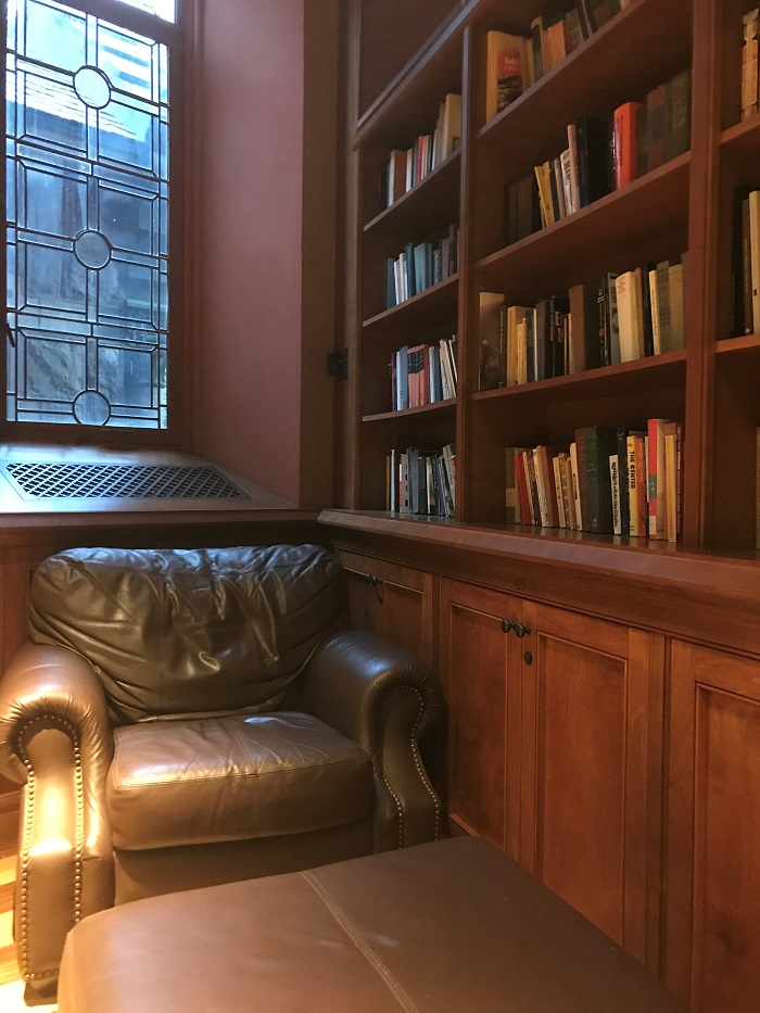 Brown leather chair with ottoman in Chancellor Green Library 