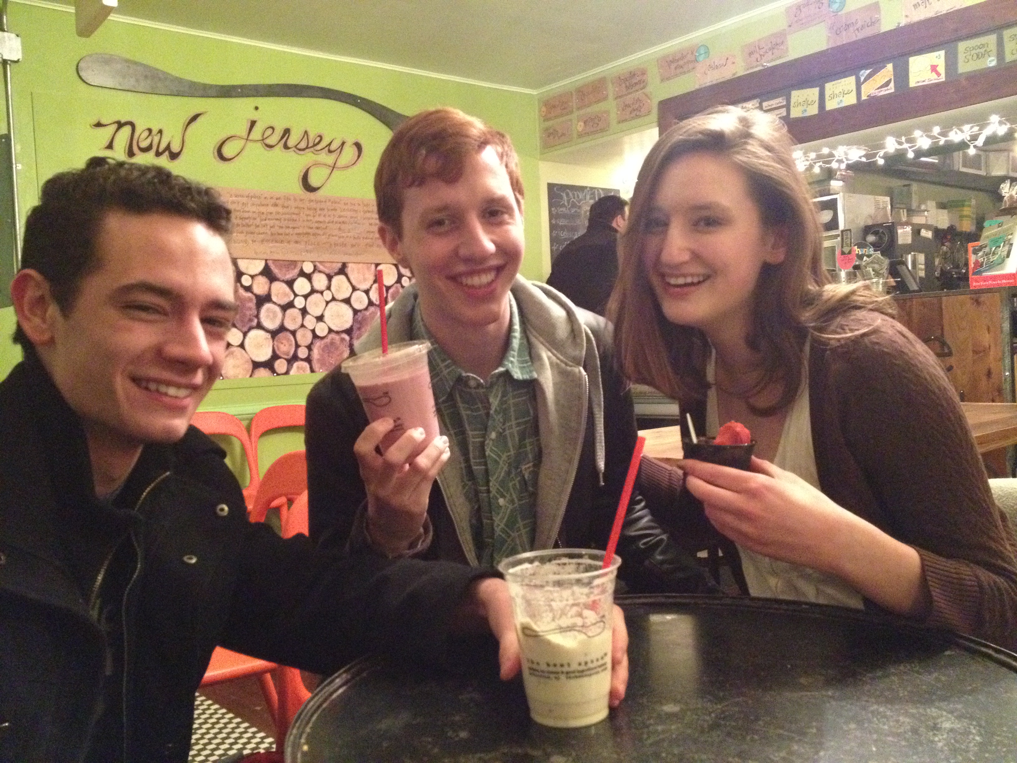 Three of my friends in Bent Spoon, showing off their milkshakes and ice cream.