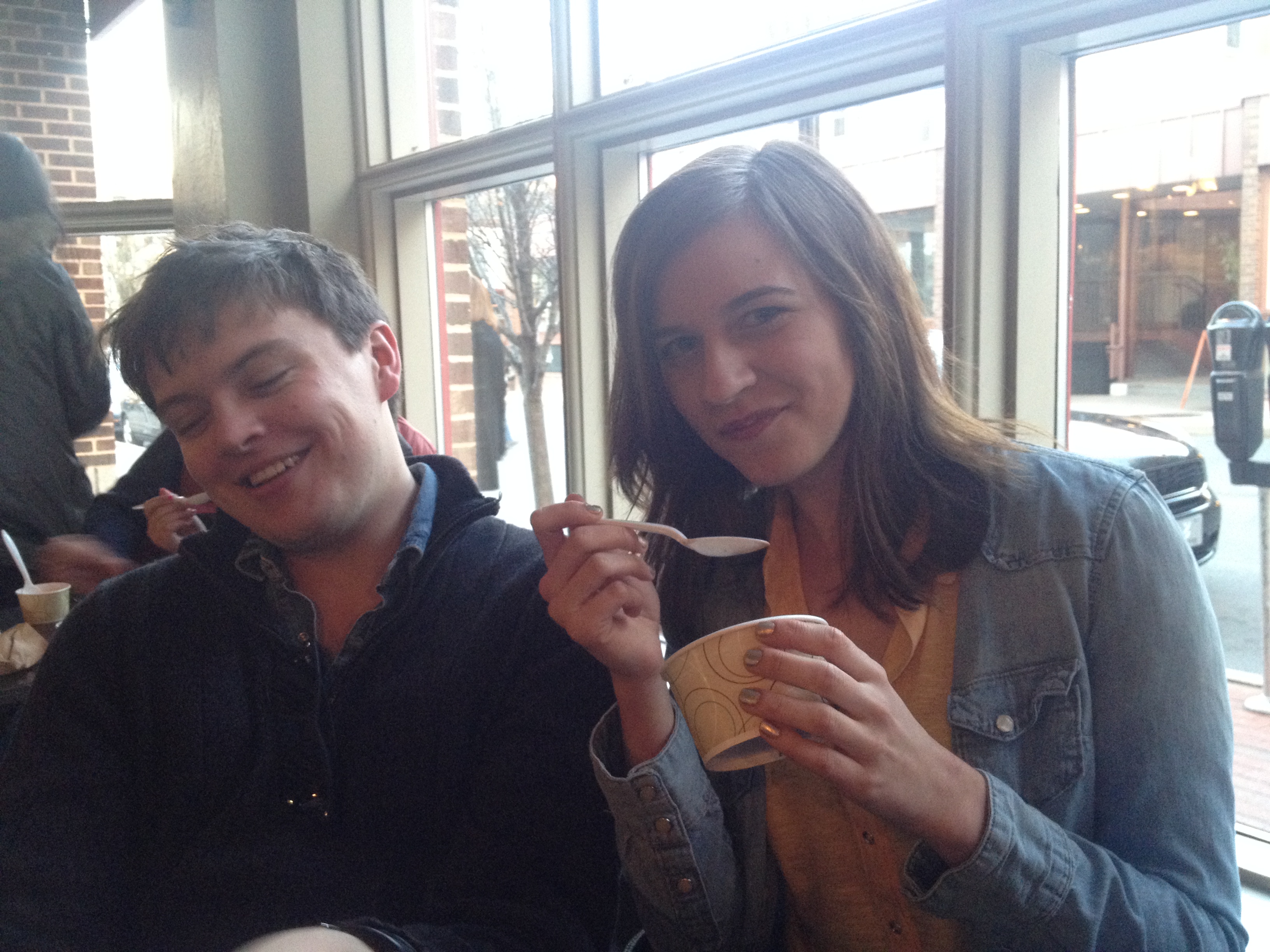My friend Rachel attractively eating Halo Pub, and her boyfriend James, looking sort of out of it.