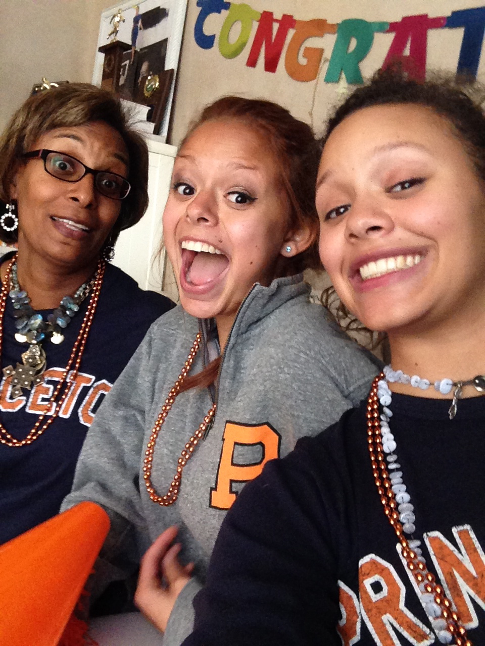 My mom, my sister and I celebrate my admission to Princeton