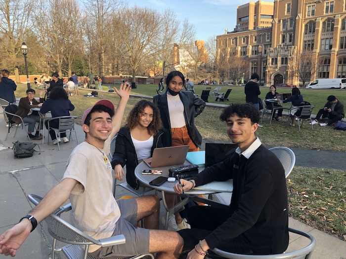 Students hanging out in Frist South Lawn after lunch late meal.