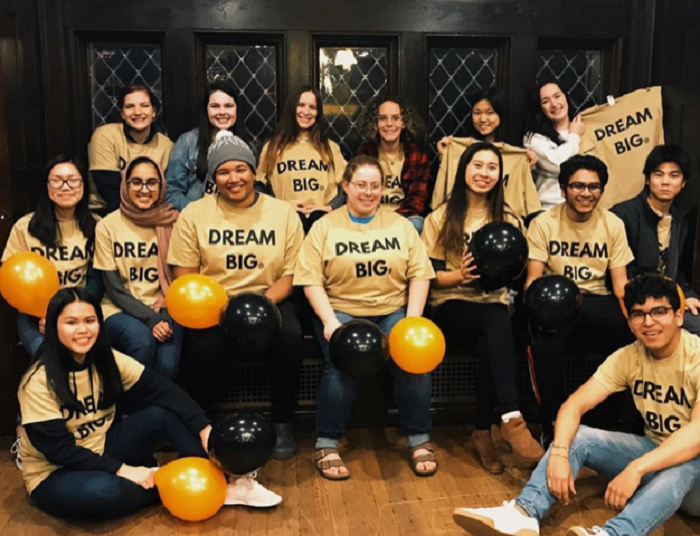 Quest Scholars wearing a QuestBridge shirt that says "Dream Big"