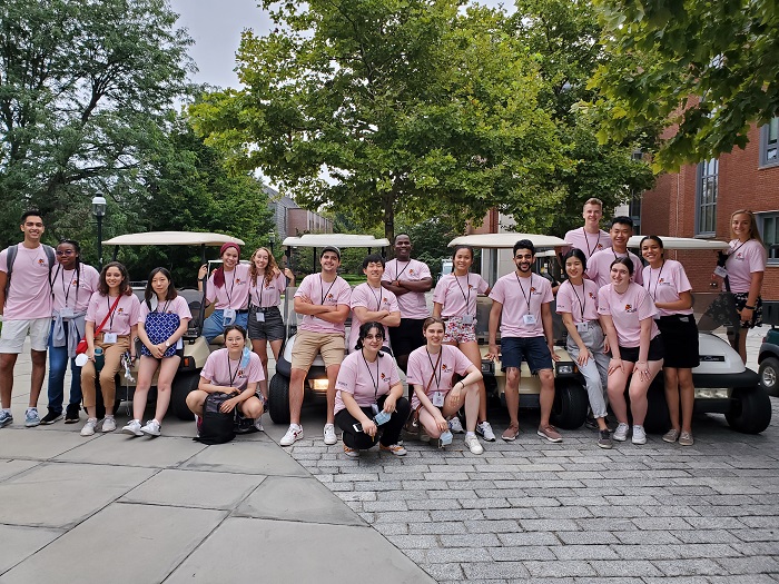 All of the Davis IC leaders standing by golf carts 