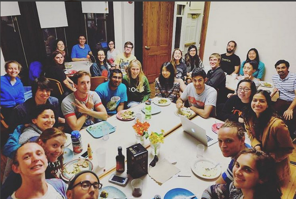 Group of students eating meals