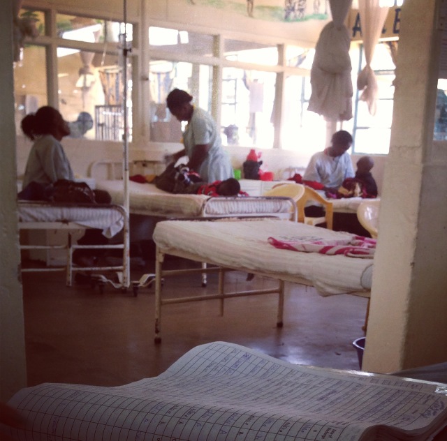 Image of pediatric ward, with mothers attending to their children