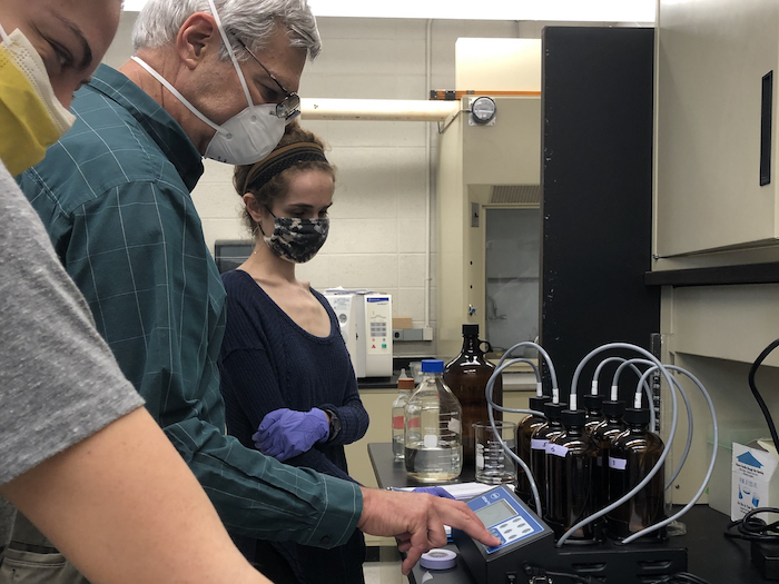 author and Professor Jaffe operating the BODTrak machine for six sample bottles