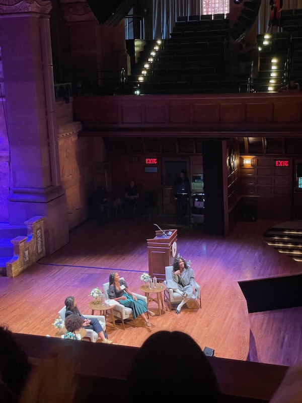 Celebrity SZA on stage at Richardson Auditorium participating in roundtable discussion