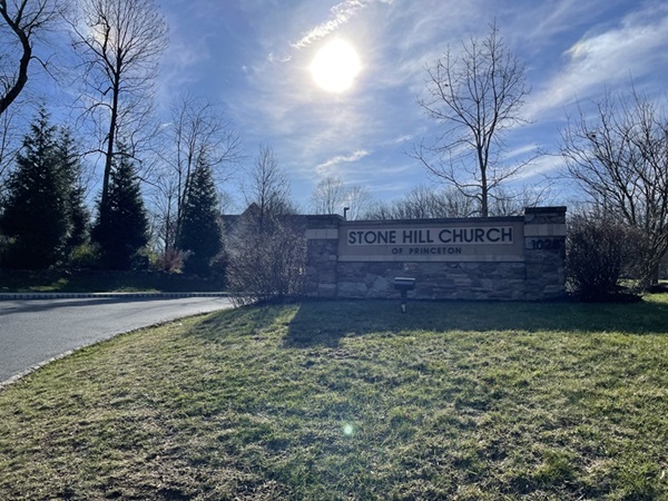 A concrete and stone sign stating “Stone Hill Church of Princeton”
